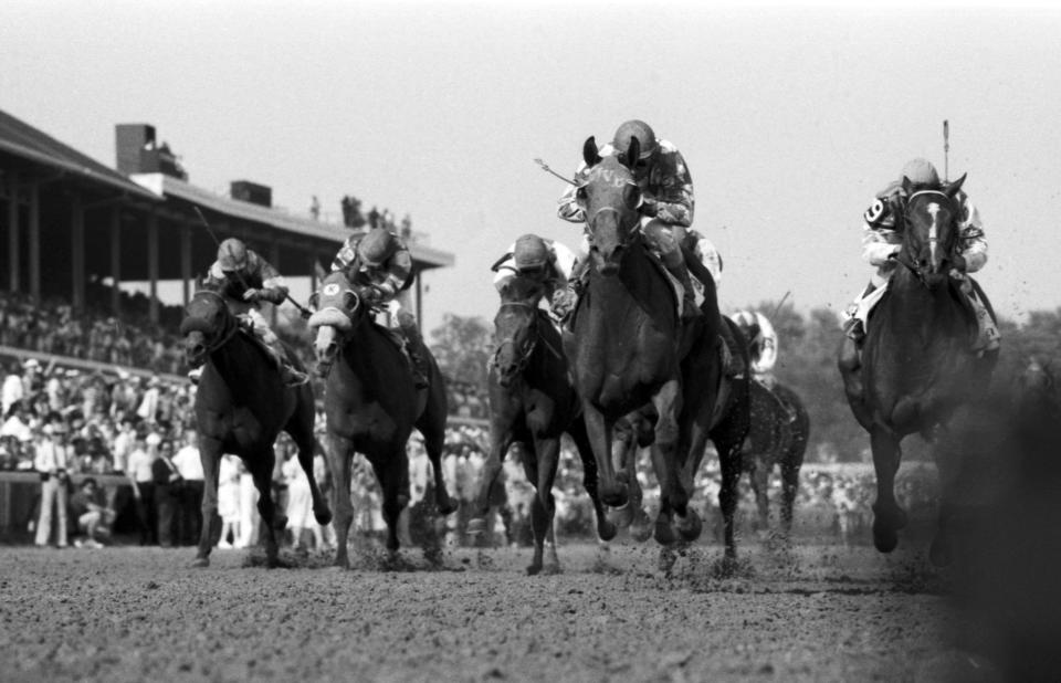 Alysheba, with jockey Chris McCarron aboard holds off Bet Twice to win the Kentucky Derby. May 2, 1987