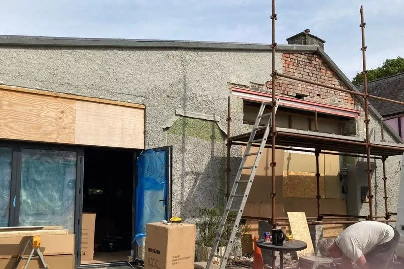 Building under construction with scaffolding