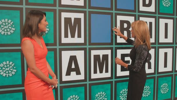 PHOTO: 'Wheel of Fortune' presenter Vanna White shows off the new puzzle board to ABC News' Veronica Miracle. (ABC News)