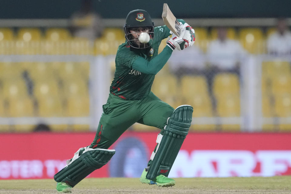 Bangladesh's Mehidy Hasan Miraz plays a shot during the ICC Cricket World Cup warm up match between Bangladesh and Sri Lanka in Guwahati, India, Friday, Sept. 29, 2023. (AP Photo/Anupam Nath)