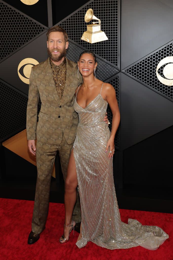 calvin harris and vick hope at 66th grammy awards