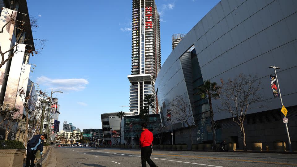 Multi-floor graffiti tags and slogans are visible on one of the three high-rise buildings at Oceanwide Plaza on March 20. Such is the prominence of the artwork that the Plaza has become known as "Graffiti Towers" to many city residents. - Mario Tama/Getty Images