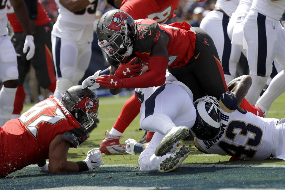 Tampa Bay Buccaneers running back Peyton Barber scores against the Los Angeles Rams during the first of an NFL football game Sunday, Sept. 29, 2019, in Los Angeles. (AP Photo/Marcio Jose Sanchez)