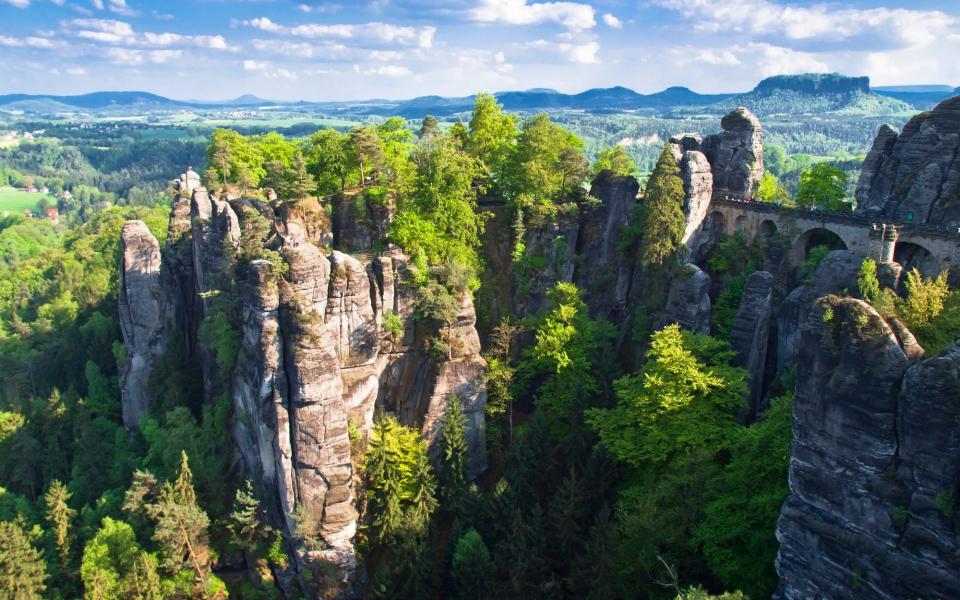 view of mountains covered in green from above - Petroos/iStockphoto