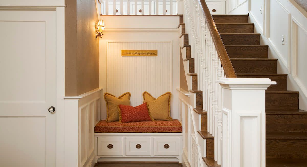 A cozy nook at the base of the staircase