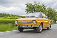 <p>Skoda had big plans to turn its quirky 1000mb into a coupe, but this was quickly dropped due to structural issues. Instead, it took a 110 saloon, chopped the rear, and the 110 R was born. Around <strong>57,000 </strong>cars were built, and notably, some featured Porsche-like hubcaps. At the rear, two side-mounted fins fed air to the<strong> 52bhp</strong> 1.1-litre engine. </p>