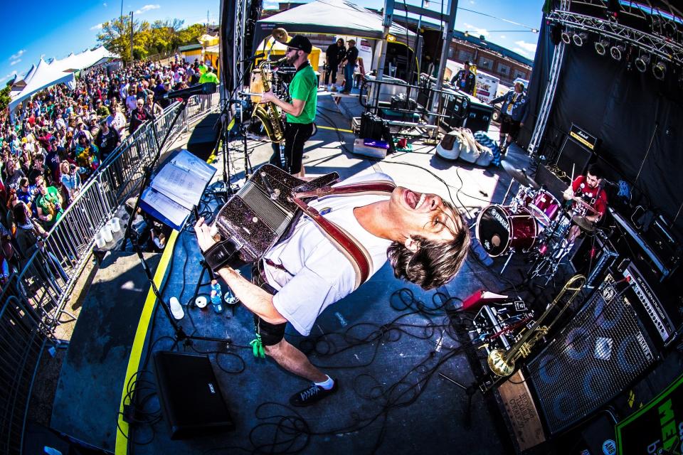 Contemporary polka king Alex Meixner bends over backwards to ensure a good show at German Fest in 2019.