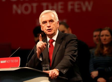 FILE PHOTO: Britain's Shadow Finance Minister John McDonnell speaks at the Labour Party Post-Budget Rally in West Bromwich, Britain, November 23, 2017. REUTERS/Darren Staples