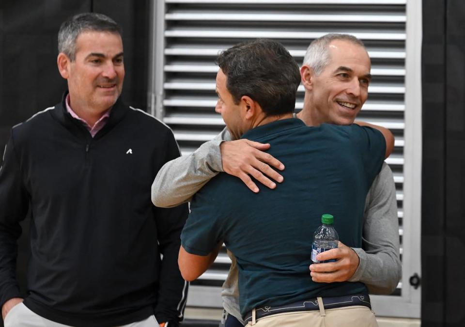 Rick Schnall, right, smiles as he receives a hug following the Charlotte Hornets practice on Tuesday, October 3, 2023 at Spectrum Center. In June 2023, Schnall and Gabe Plotkin purchased the Charlotte Hornets from majority owner, Michael Jordan.