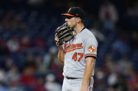 Baltimore Orioles pitcher John Means wipes his face during the seventh inning of an interleague baseball game against the Philadelphia Phillies, Monday, Sept. 20, 2021, in Philadelphia. (AP Photo/Matt Slocum)