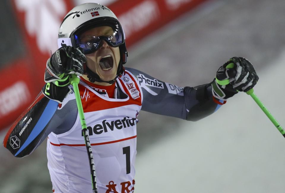 Norway's Henrik Kristoffersen celebrates after winning the men's giant slalom, at the alpine ski World Championships in Are, Sweden, Friday, Feb. 15, 2019. (AP Photo/Alessandro Trovati)