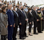 Israeli Prime Minister Benjamin Netanyahu, center, attends at a memorial ceremony for fallen soldiers at the Yad LeBanim House on the eve of Memorial Day, in Jerusalem, Tuesday, April 13, 2021. (Debbie Hill/Pool Photo via AP)