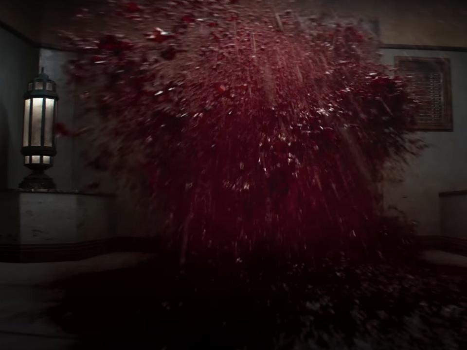 Blood exploding through a window.