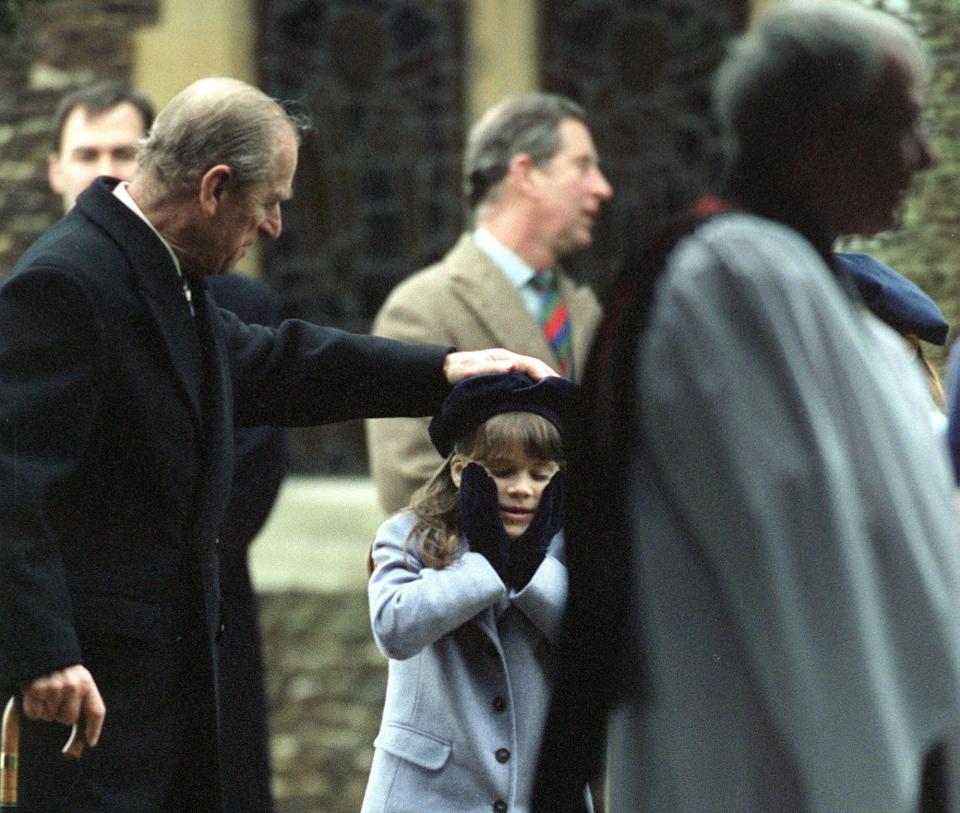 Prince Philip playing with his granddaughter, Princess Eugenie, in one of the photos that she shared on Instagram.  (Photo: Tim Graham via Getty Images)