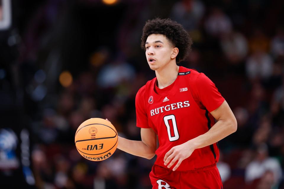 Mar 9, 2023; Chicago, IL, USA; Rutgers Scarlet Knights guard Derek Simpson (0) brings the ball up court against the Michigan Wolverines during the first half at United Center. Mandatory Credit: Kamil Krzaczynski-USA TODAY Sports