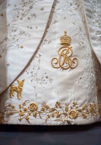 <p>Royal Collection Trust/Ã‚Â© His Majesty King Charles III 2023</p> Queen Camilla's coronation gown displayed at Buckingham Palace