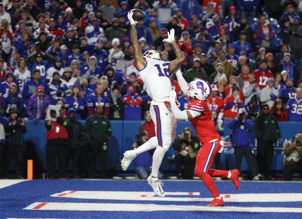 New York Giants tight end Darren Waller (12) goes up over Buffalo Bills cornerback Taron Johnson (7) but can’t make the catch on the last play of the game the would have won the game for New York. Instead the Bills held on to win 14-9