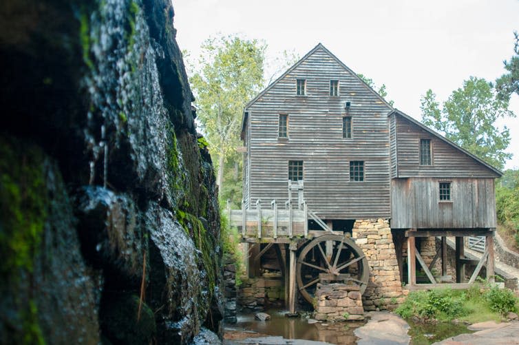 <span class="caption">Old millhouses – like this building in the US – are often raised above ground level, in anticipation of flooding.</span> <span class="attribution"><a class="link " href="https://www.shutterstock.com/image-photo/county-park-raleigh-nc-1546072121" rel="nofollow noopener" target="_blank" data-ylk="slk:StudioKismet/Shutterstock;elm:context_link;itc:0;sec:content-canvas">StudioKismet/Shutterstock</a></span>