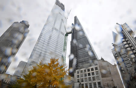 FILE PHOTO: Skyscrapers during rainfall in the City of London, Britain, November 9, 2018. REUTERS/Toby Melville/File Photo