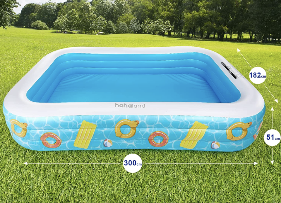 Self Inflatable Swimming Pool on green grass against trees and sky (Photo via Amazon)