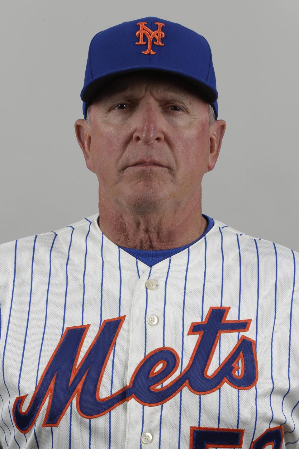 FILE - This is a Feb. 19, 2013 file photo showing New York Mets pitching coach Dan Warthen posed at spring training in Port St. Lucie, Fla. Warthen and the Mets apologized after the team's pitching coach used a racial slur in describing the translator for New York pitcher Daisuke Matsuzaka. "I apologize for the thoughtless remarks that I made yesterday in the clubhouse," Warthen said in statement released by the team Wednesday, March 12, 2014. (AP Photo/Julio Cortez, File)