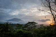 <p>A view of mount Agung in Karangasem regency, Island of Bali, Indonesia. Indonesian authorities raised the alert level for the Mount Agung volcano to the highest level as up to 50,000 villagers around the mountain evacuated their homes and travel warnings have been issued for the popular tourist destination. (Ulet Ifansasti/Getty Images) </p>