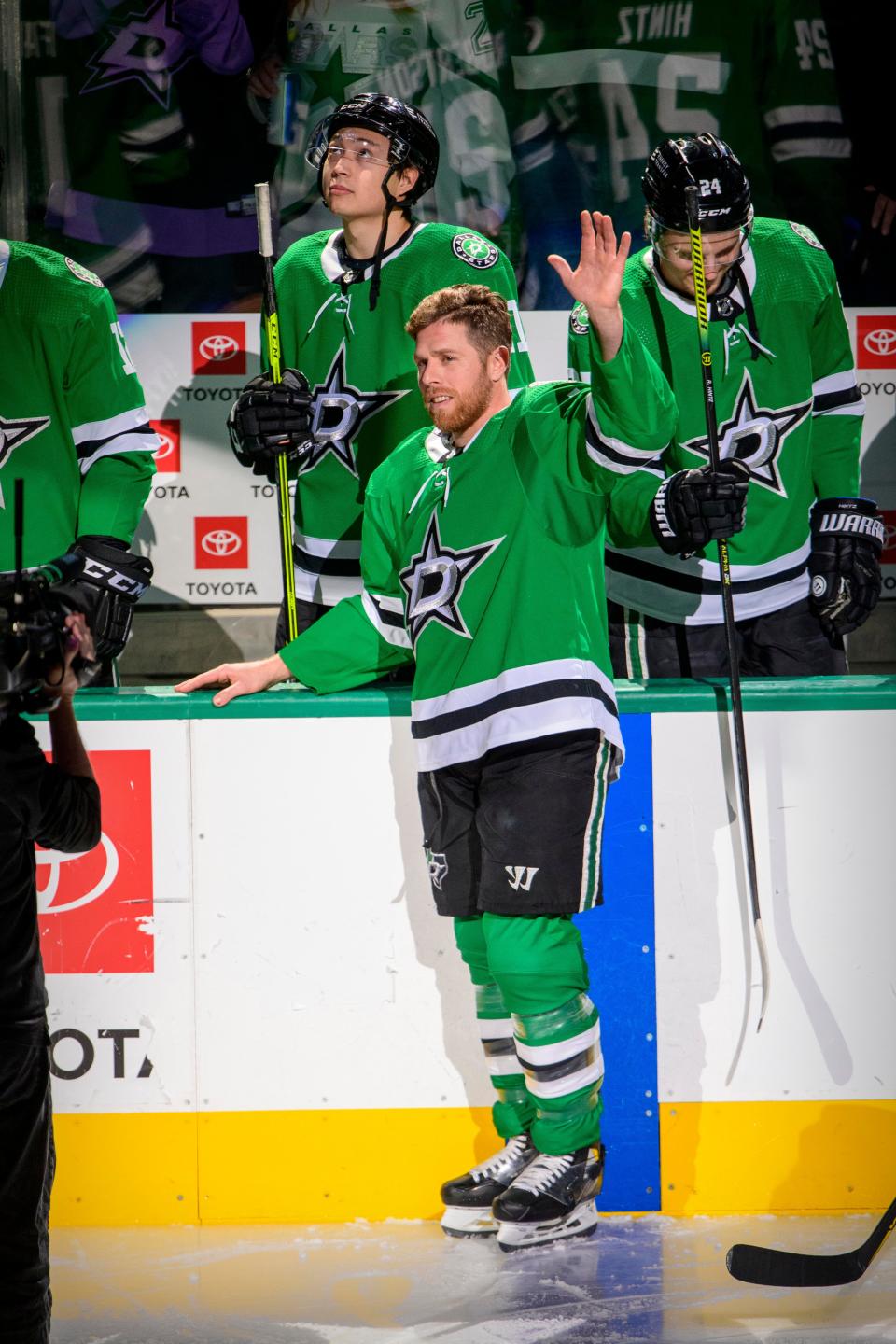 Dallas Stars center Joe Pavelski (16) waves to the crowd as he is recognized for scoring 400 career NHL goals before the game against the Arizona Coyotes on Dec. 6 at American Airlines Center.