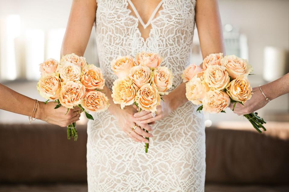 Yellow, Bouquet, Petal, Hand, Flower, Photograph, Peach, Cut flowers, Dress, Floristry, 