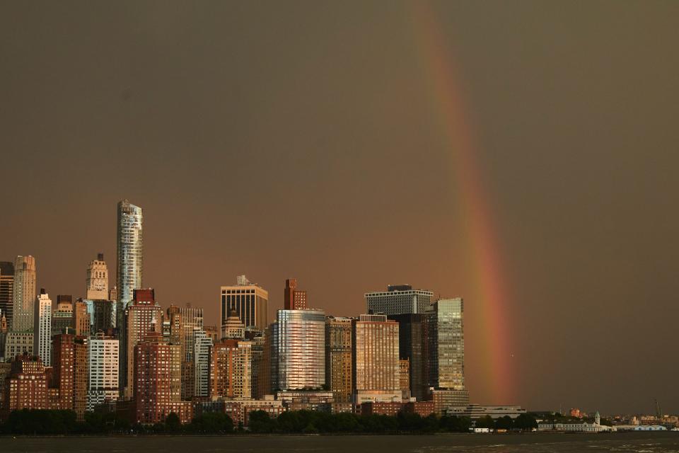 A rainbow is seen in the sky above Lower Manhattan area of New York from across the Hudson River on the 22th anniversary of the 9/11 terror attacks, Monday, Sept. 11, 2023, in Jersey City, N.J. (AP Photo/Andres Kudacki)