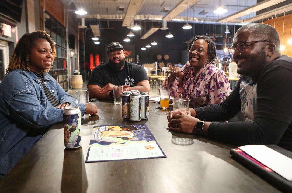 Melanated Mash Makers club members (from left) Adena Brewington-Brown, Vernell Jackson, Alisha "Shaggy" Gentles and Imani Powell come together to chat about their beer bond at Autumn Arch Beer Project in Glasgow.