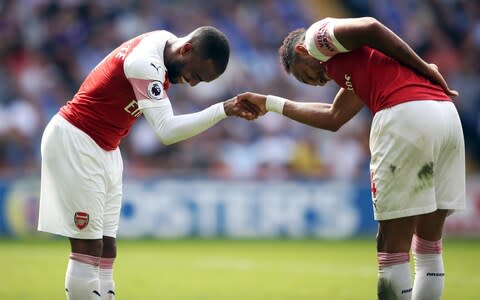 Aubameyang has struck up a lethal partnership with Lacazette - Credit: PA