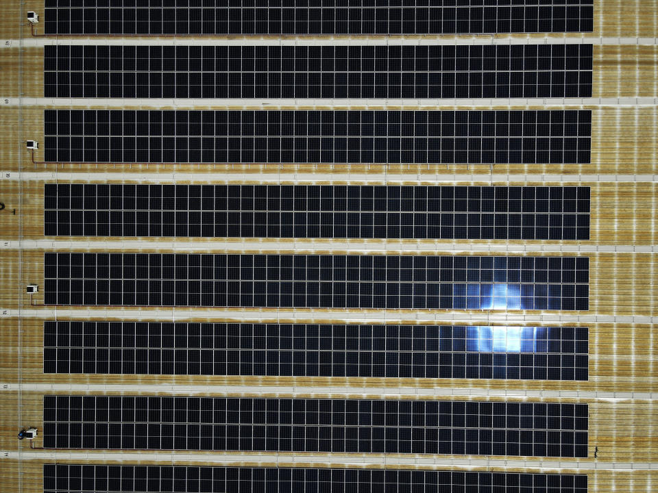 View of solar panels installed by Pireos Power on the roof of a warehouse in the state of Mexico, Wednesday, April 13, 2022. (AP Photo/Marco Ugarte)