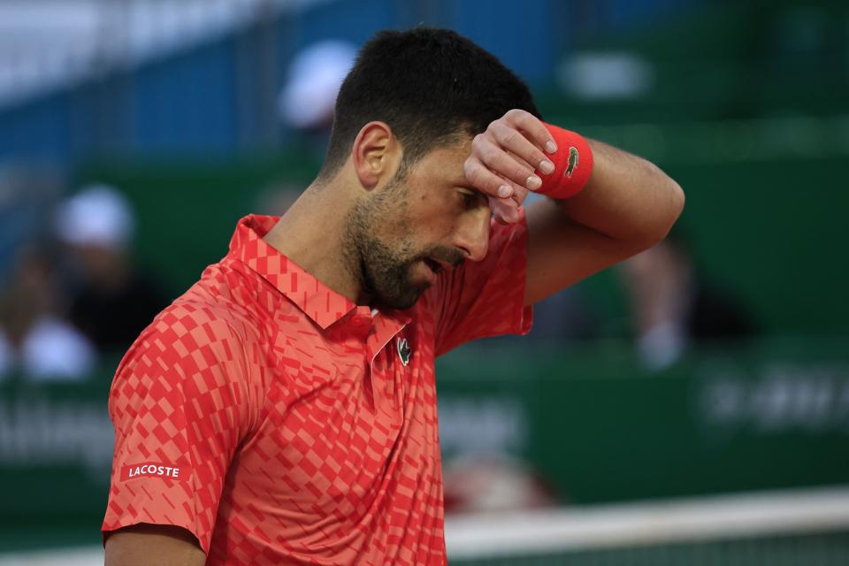 Novak Djokovic frustrated during a match.