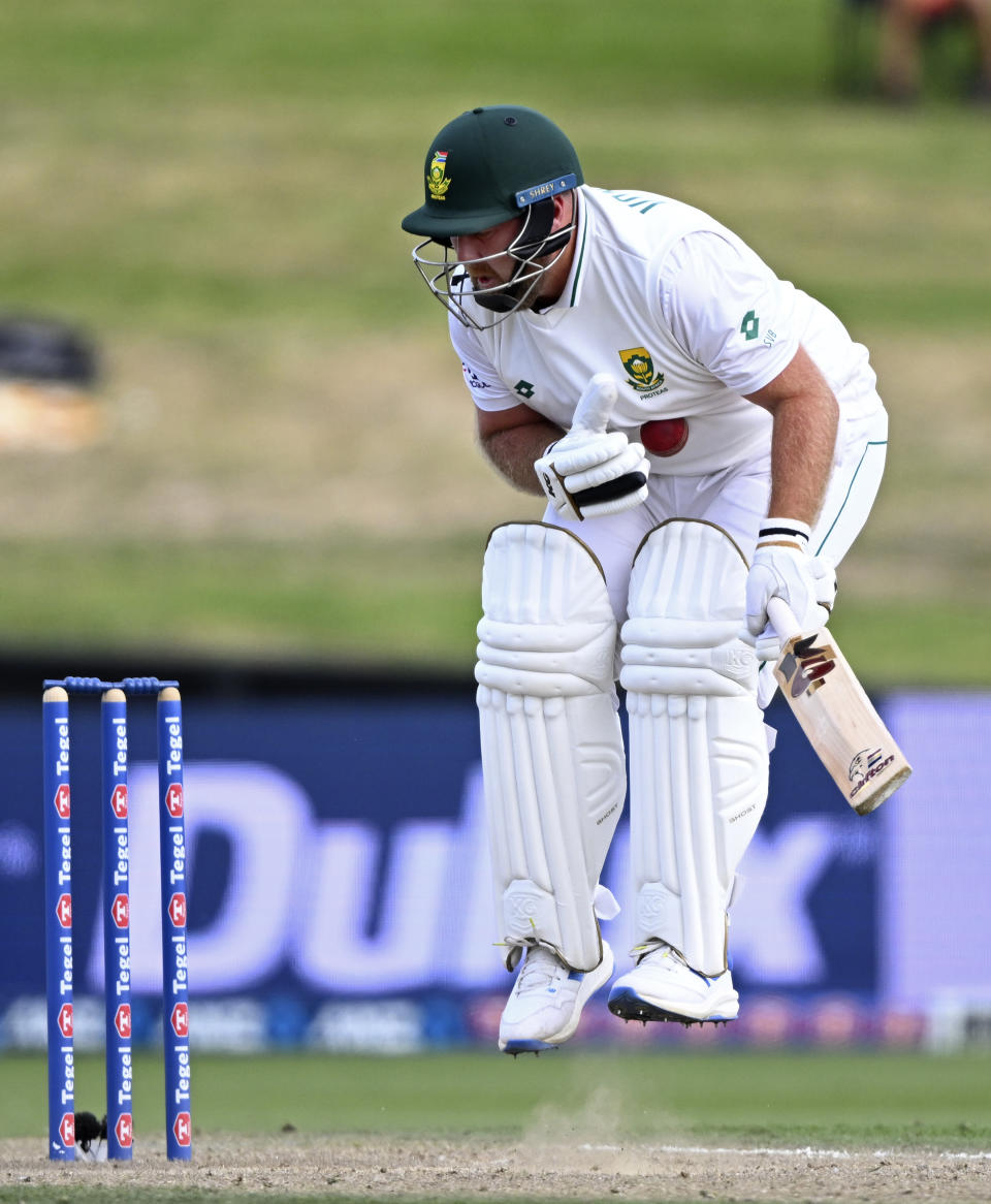 South Africa's Shaun von Berg is struck by the ball as he bats against New Zealand on the third day of their cricket test in Hamilton, New Zealand. Thursday, Feb. 15, 2024. (Andrew Cornaga/Photosport via AP)