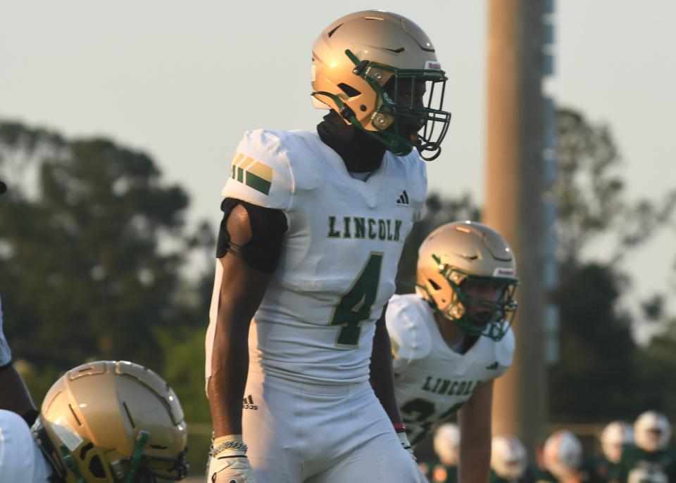 Lincoln senior linebacker Samarian Robinson waits for the snap