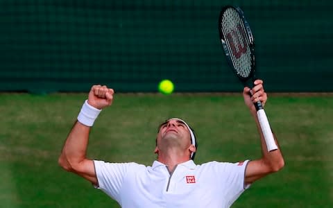 Switzerland's Roger Federer celebrates beating Spain's Rafael Nadal during their men's singles semi-final match on day 11 of the 2019 Wimbledon Championships at The All England Lawn Tennis Club in Wimbledon, southwest London, on July 12, 2019. - Credit: AFP