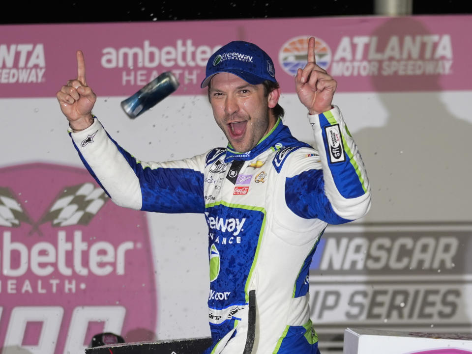 Daniel Suarez reacts after winning the NASCAR auto race at Atlanta Motor Speedway Sunday, Feb. 25, 2024, in Hampton, Ga. (AP Photo/John Bazemore)