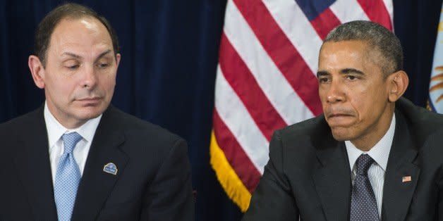 US President Barack Obama speaks alongside Secretary of Veterans Affairs Robert McDonald (L) following a briefing on US military veterans healthcare at the Veterans Affairs (VA) Medical Center in Phoenix, Arizona, March 13, 2015. The government announced a new advisory committee of private sector, non-profit and government leaders to improve the VA's ability to improve care for veterans from the Phoenix VA that was at the center of scandal last year regarding the health care of US military veterans. AFP PHOTO / SAUL LOEB        (Photo credit should read SAUL LOEB/AFP/Getty Images) (Photo: )