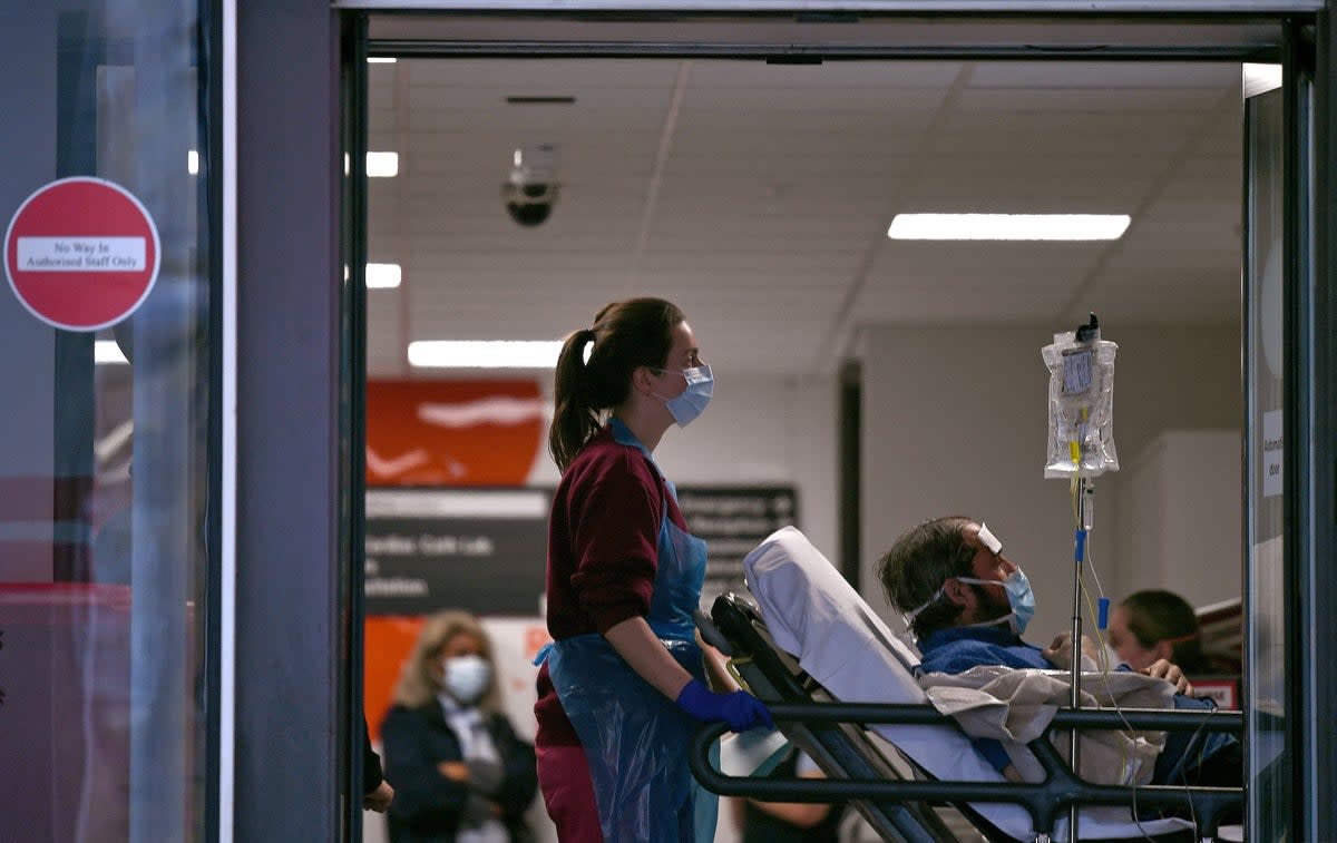 Some experts have advised people to consider wearing face masks in certain settings (AFP via Getty Images)