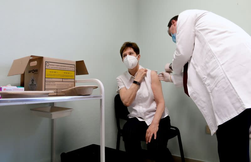 FILE PHOTO: Healthcare worker Kertesz receives Pfizer-BioNTech COVID-19 vaccine in Budapest