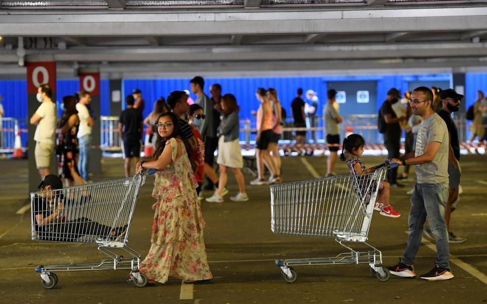 People queue at Ikea in Wembley as it re-opens, following the outbreak of the coronavirus disease - Reuters