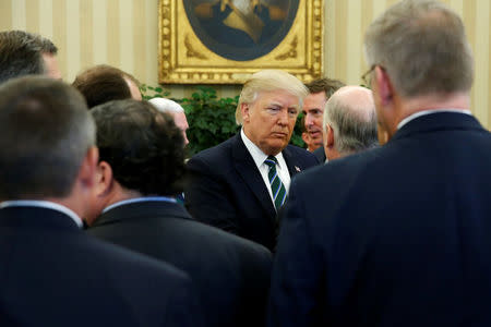 U.S. President Donald Trump meets with members of the Republican Study Committee at the White House in Washington, U.S. March 17, 2017. REUTERS/Jonathan Ernst