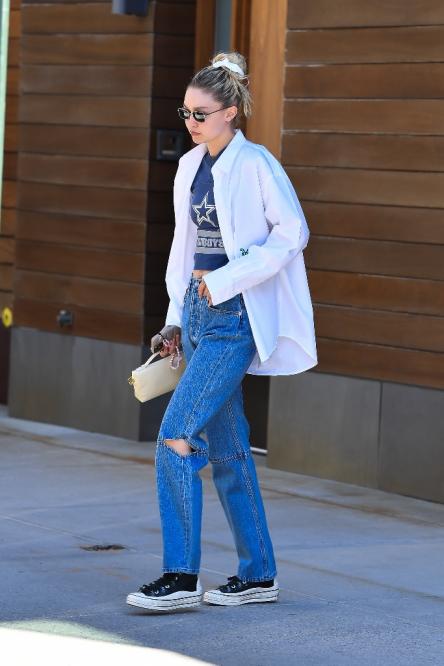 Gigi Hadid Has a Skater-Chic Moment in a Crop Top, Wide-Leg Pants and Black  Converse High-Top Sneakers