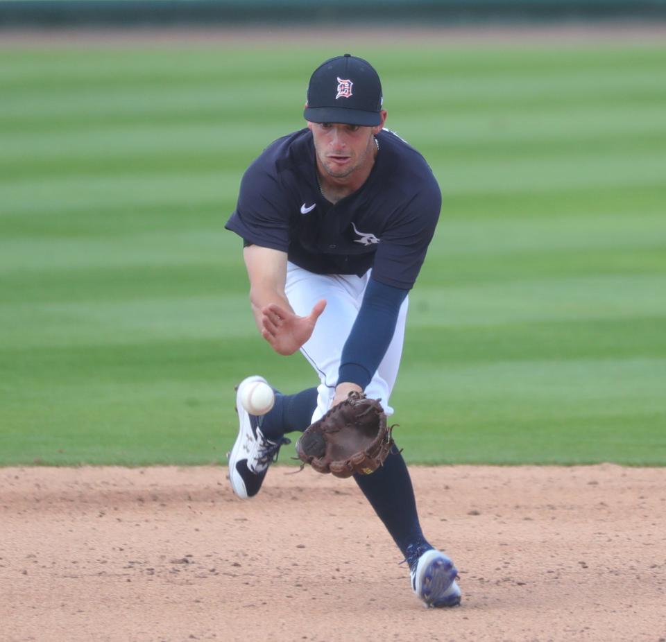 Detroit Tigers Zack Short throws to first during Grapefruit League action against the Philadelphia Phillies on Sunday, Feb. 28, 2021, at Publix Field at Joker Marchant Stadium in Lakeland, Florida.