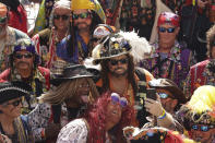 Pirates take a selfie aboard the Jose Gasparilla pirate ship as it docks at the Tampa Convention Center before the start of the Gasparilla Invasion Parade on Saturday, Jan. 27, 2024, in Tampa. (Louis Santana/Tampa Bay Times via AP)