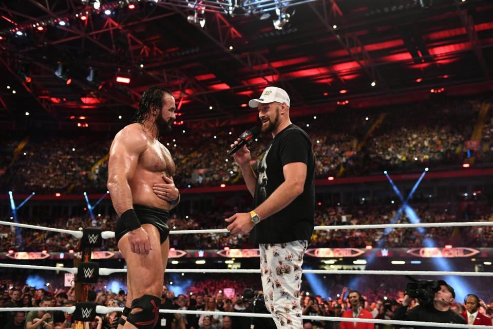 Drew McIntyre in the ring with Tyson Fury  (WWE)