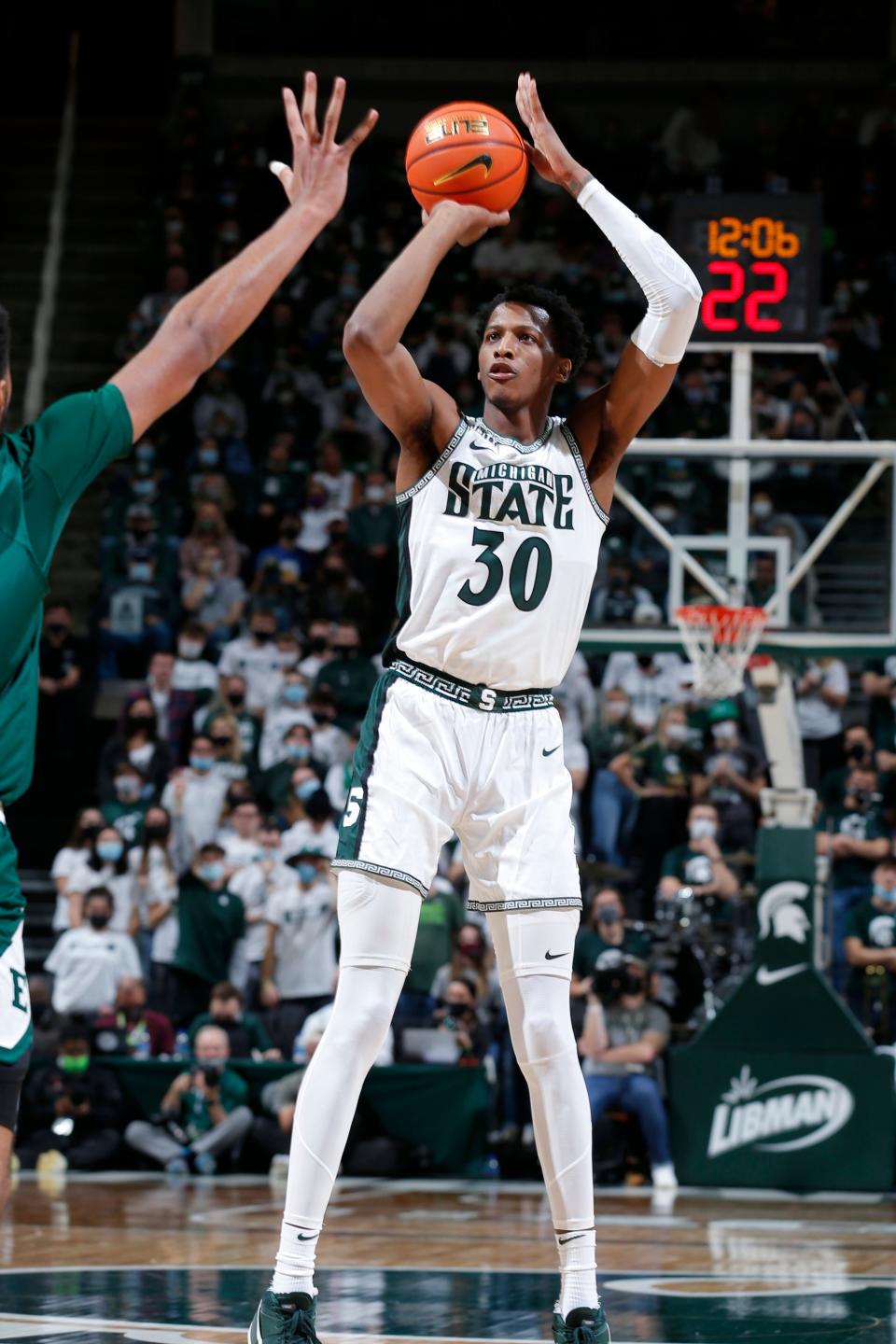 Michigan State's Marcus Bingham Jr. shoots against Eastern Michigan during the second half of MSU's 83-59 win on Saturday, Nov. 20, 2021, in East Lansing.