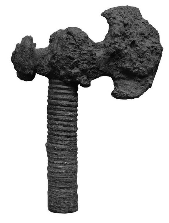 This iron axe is one of many weapons found with the burial of the warrior. (Photo courtesy Valentina Mordvintseva) <br> <br> <a href="http://www.livescience.com/27271-ancient-treasure-caucasus.html" rel="nofollow noopener" target="_blank" data-ylk="slk:Click here to see the full collection at LiveScience.com;elm:context_link;itc:0;sec:content-canvas" class="link ">Click here to see the full collection at LiveScience.com</a>