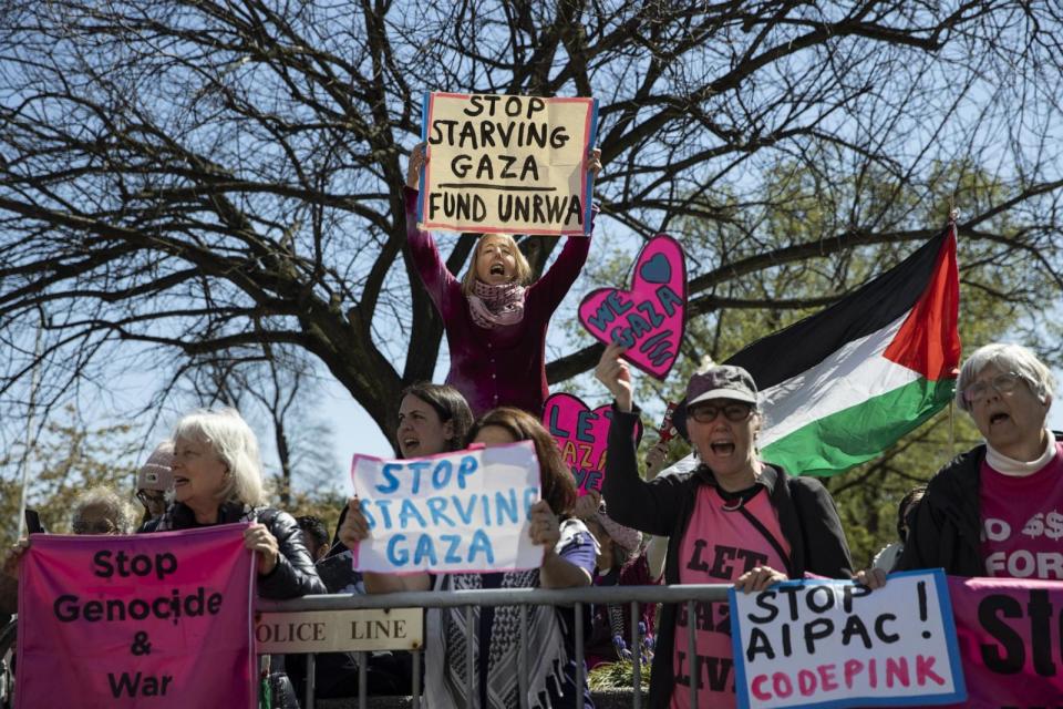PHOTO: Pro-Palestinian protestors hold banners and chant slogans during a rally against the Israeli Defense Minister Yoav Gallant's visit to the U.S. State Department, March 25, 2024, in Washington. (Mostafa Bassim/Anadolu via Getty Images)