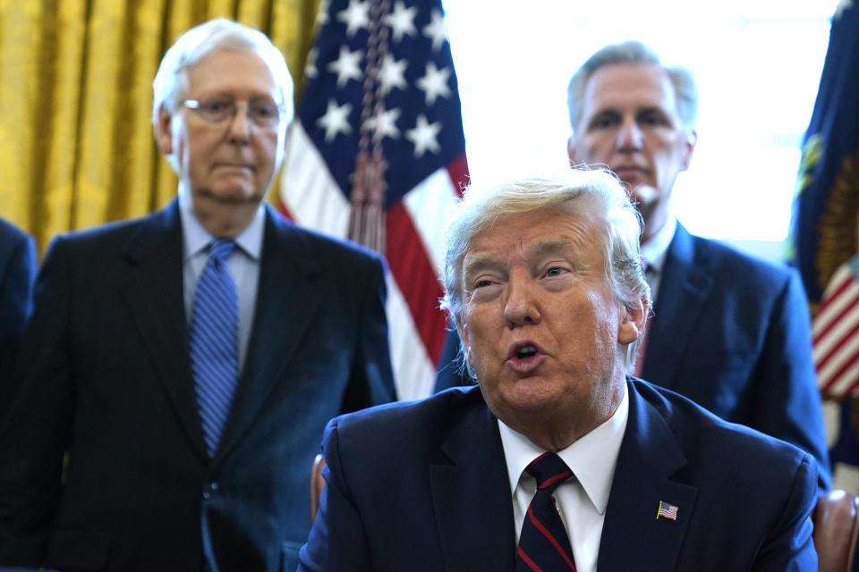President Donald Trump and Senate Republican leader Mitch McConnell (far left) publicly oppose relief funding for states as they face budget shortfalls caused by the coronavirus pandemic. (Photo: ASSOCIATED PRESS)